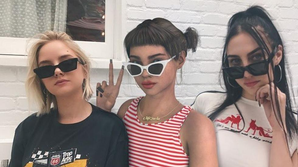 Lil Miquela posing with instagram influencers of her age