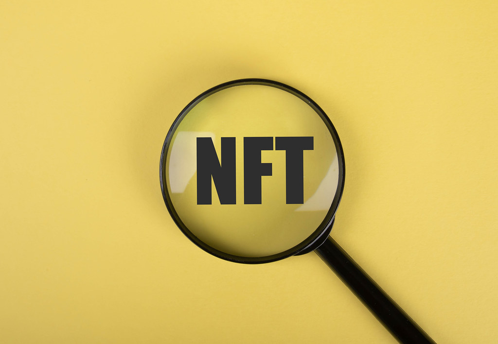 NFT sign under the magnifying glass