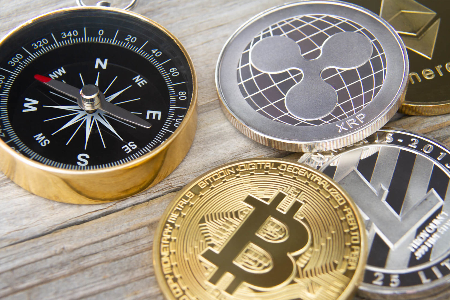 crypto coins and a compass