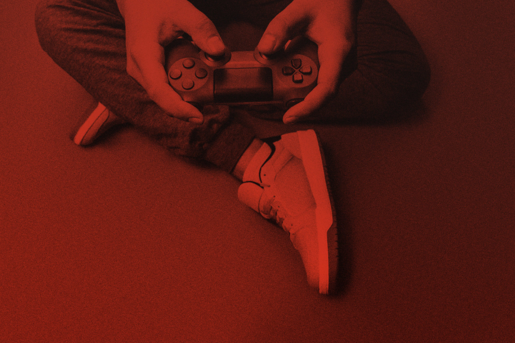 picture of a person holding a video game controller