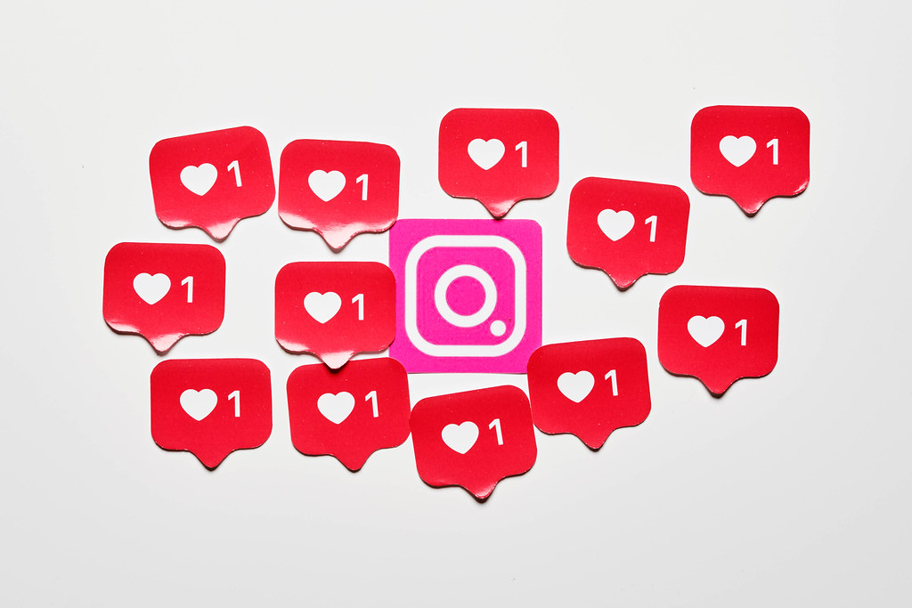 red love hearts around the Instagram logo