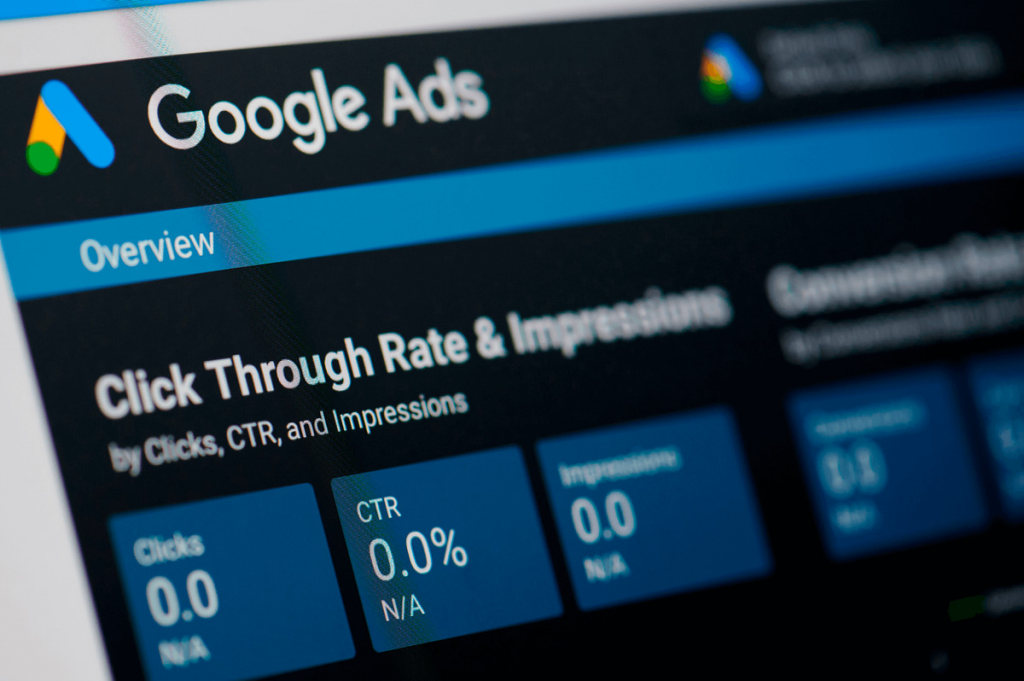 Image of a laptop displaying Google Ads metrics